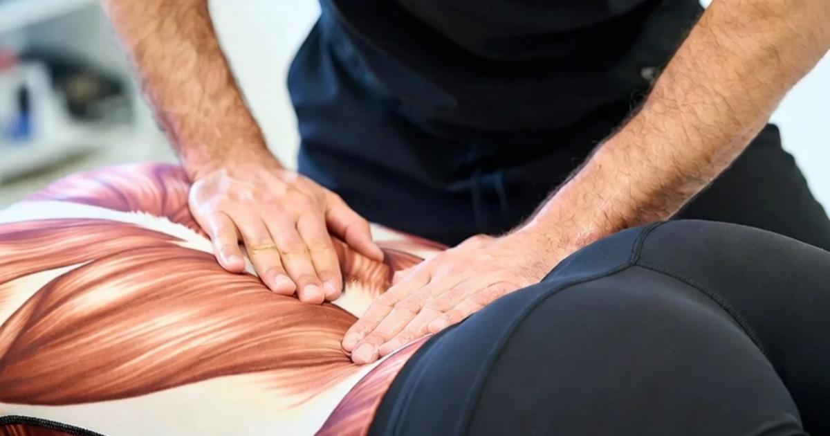 Massage therapy for low back pain in Olympia WA with a licensed massage therapist performing deep tissue bodywork